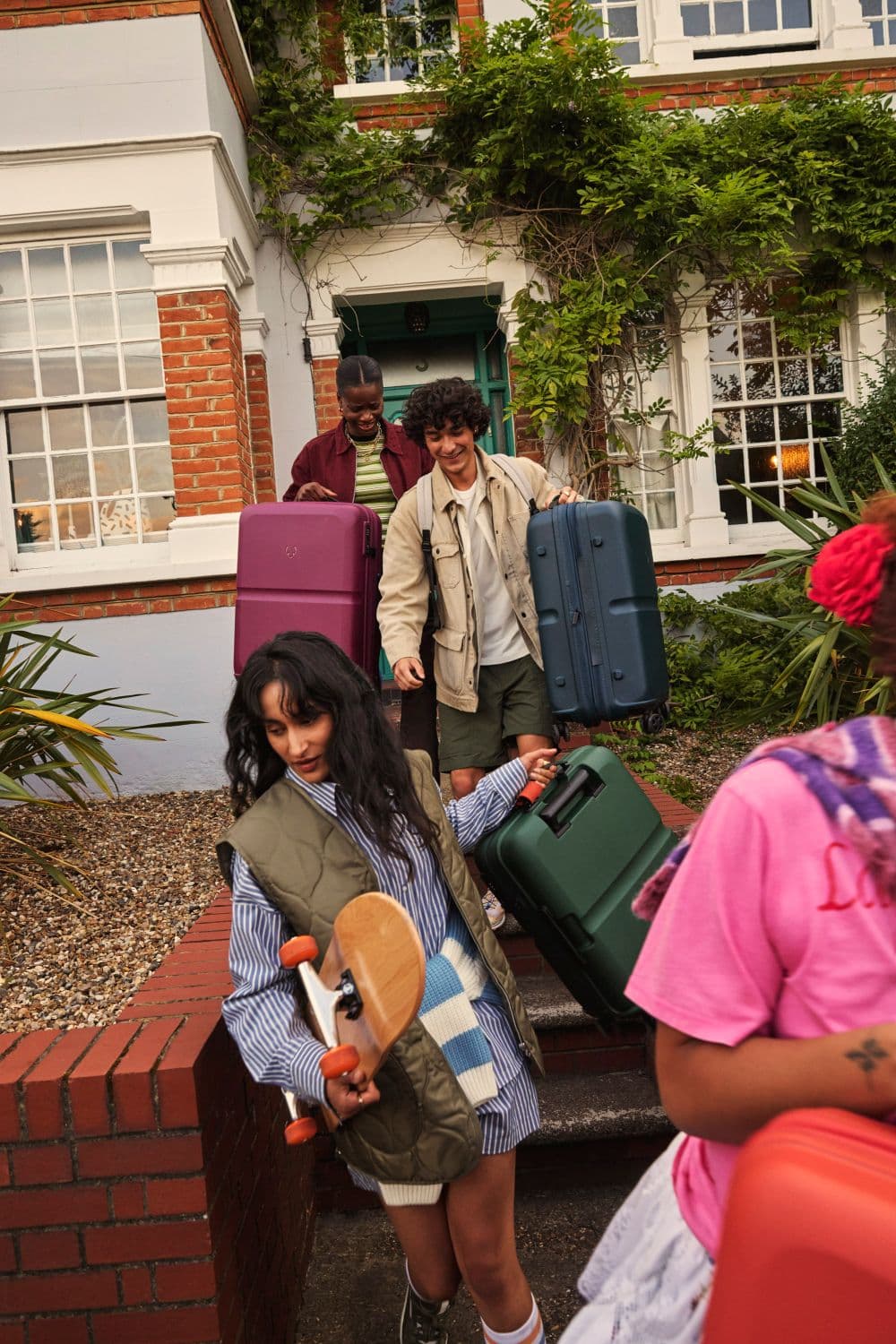 Guests arriving with their luggage at a Loko guesthouse